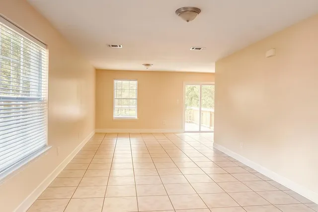 a view of an empty room and window