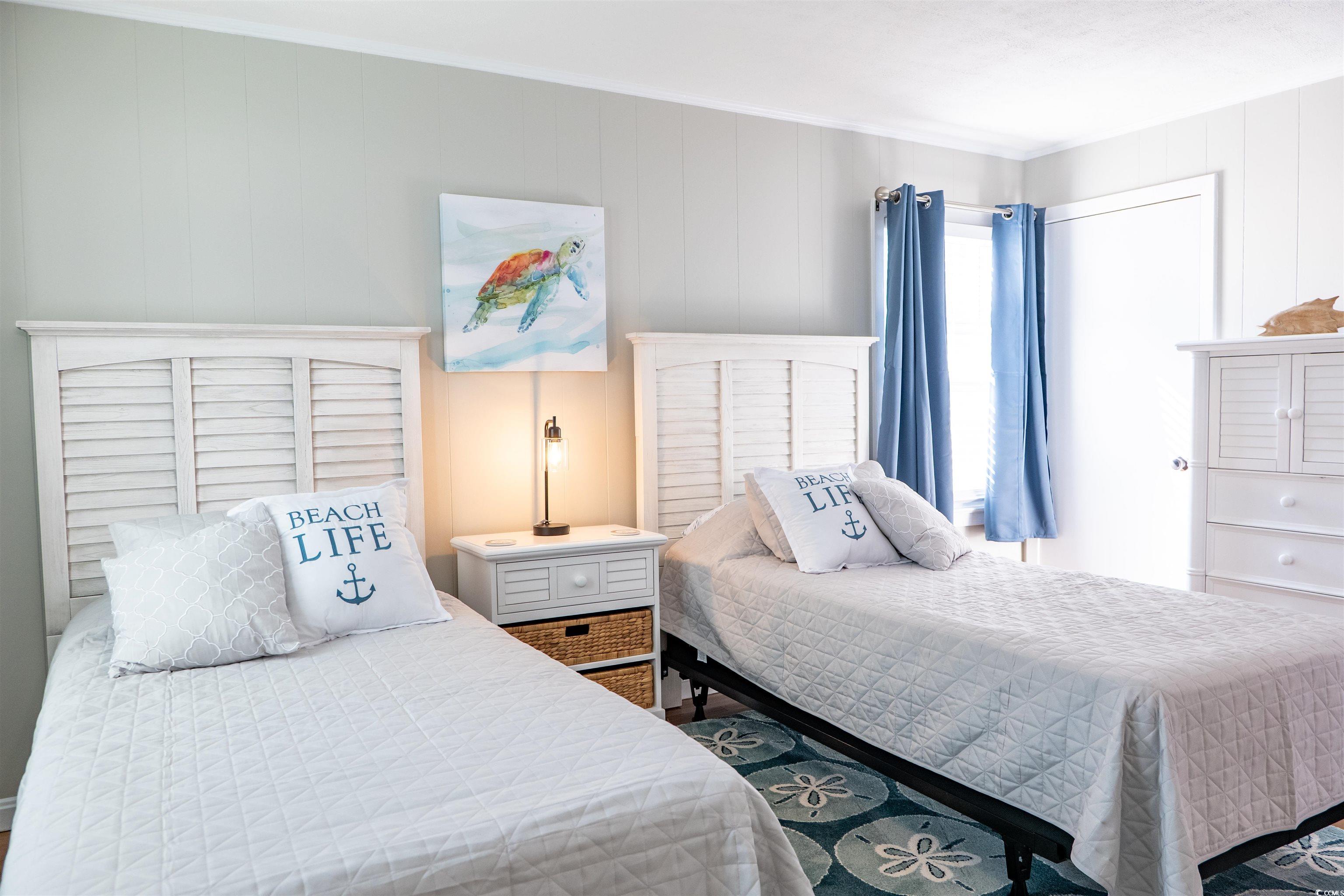 415 Sundial Drive Pawleys Island, SC 29585 - Photo 15 of 35 Kitchen featuring ceiling fan, white cabinetry, appliances with stainless steel finishes, light stone counters, and recessed lighting