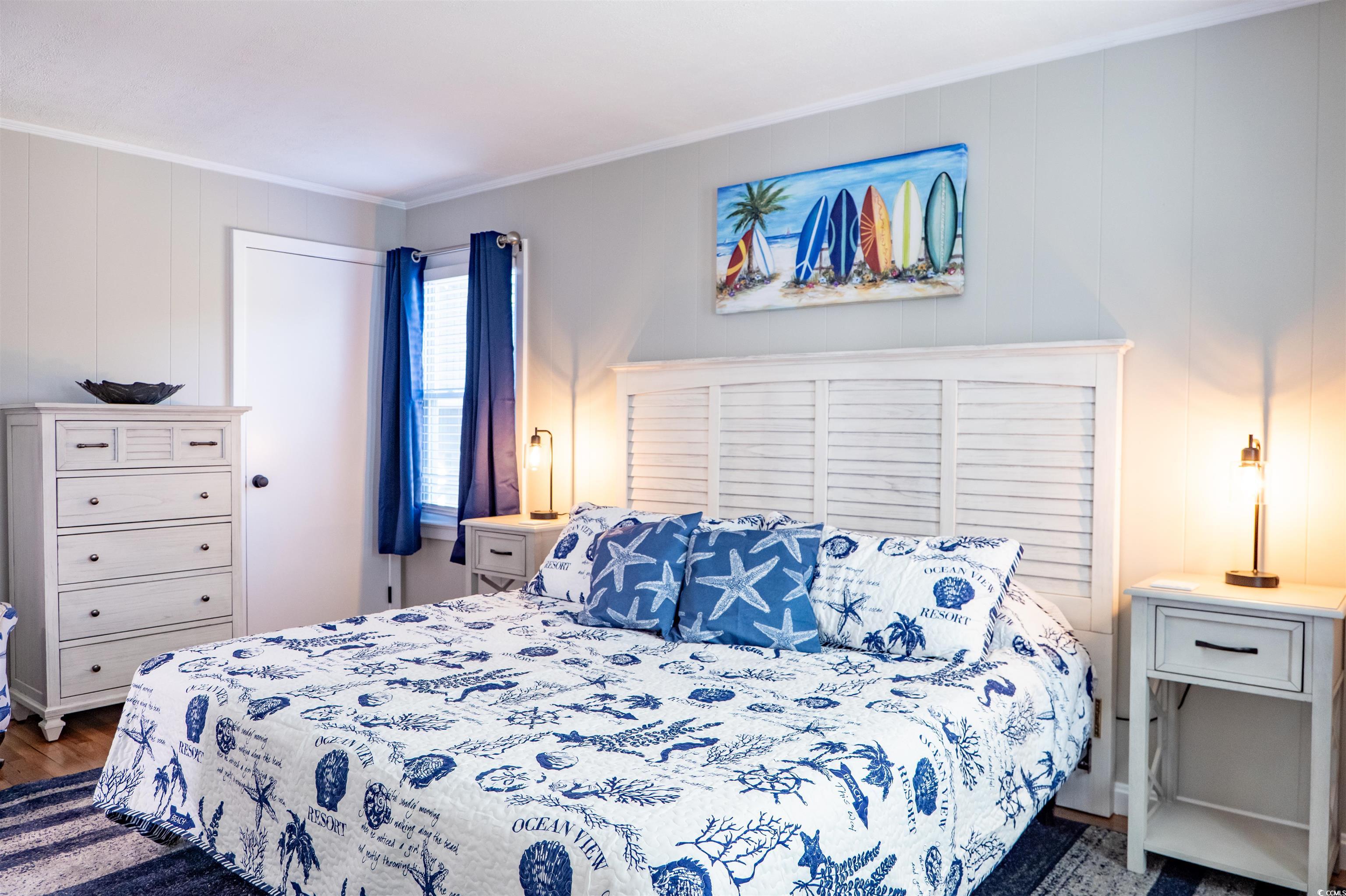 415 Sundial Drive Pawleys Island, SC 29585 - Photo 17 of 35 Bathroom featuring wood finished floors and baseboards