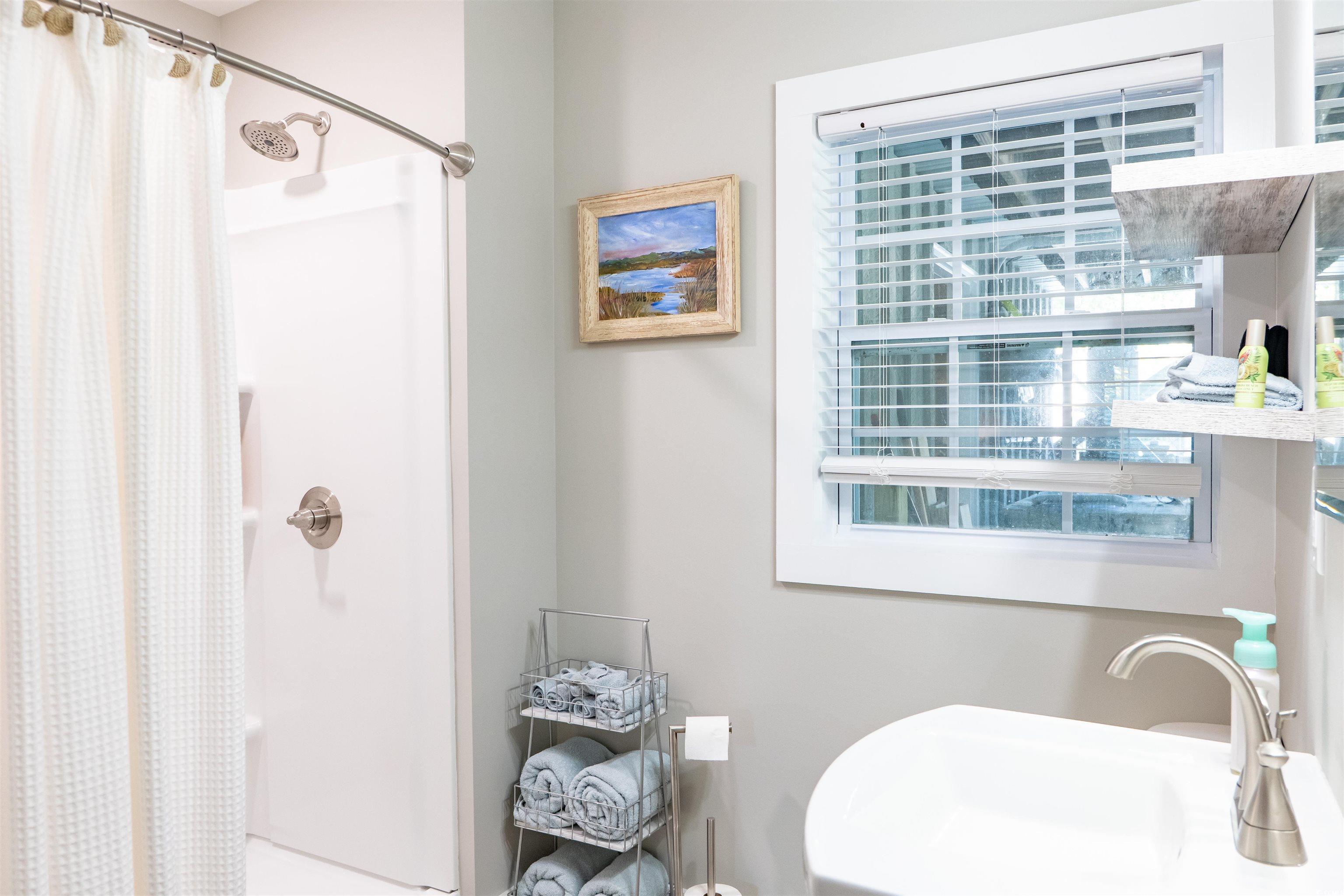 415 Sundial Drive Pawleys Island, SC 29585 - Photo 24 of 35 Ensuite bathroom featuring wood finished floors and ornamental molding