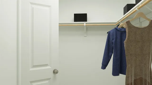 a bathroom with a shower and a mirror