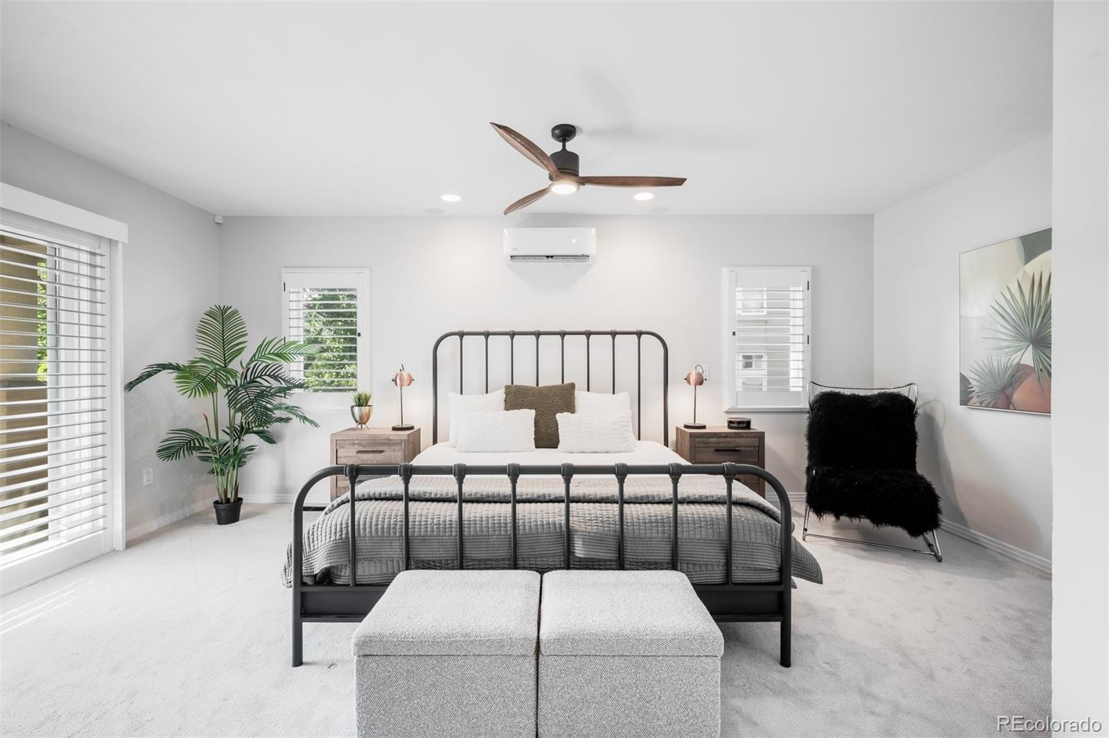 361 Detroit Street Denver, CO 80206 - Photo 30 of 46 a bedroom with furniture and a window