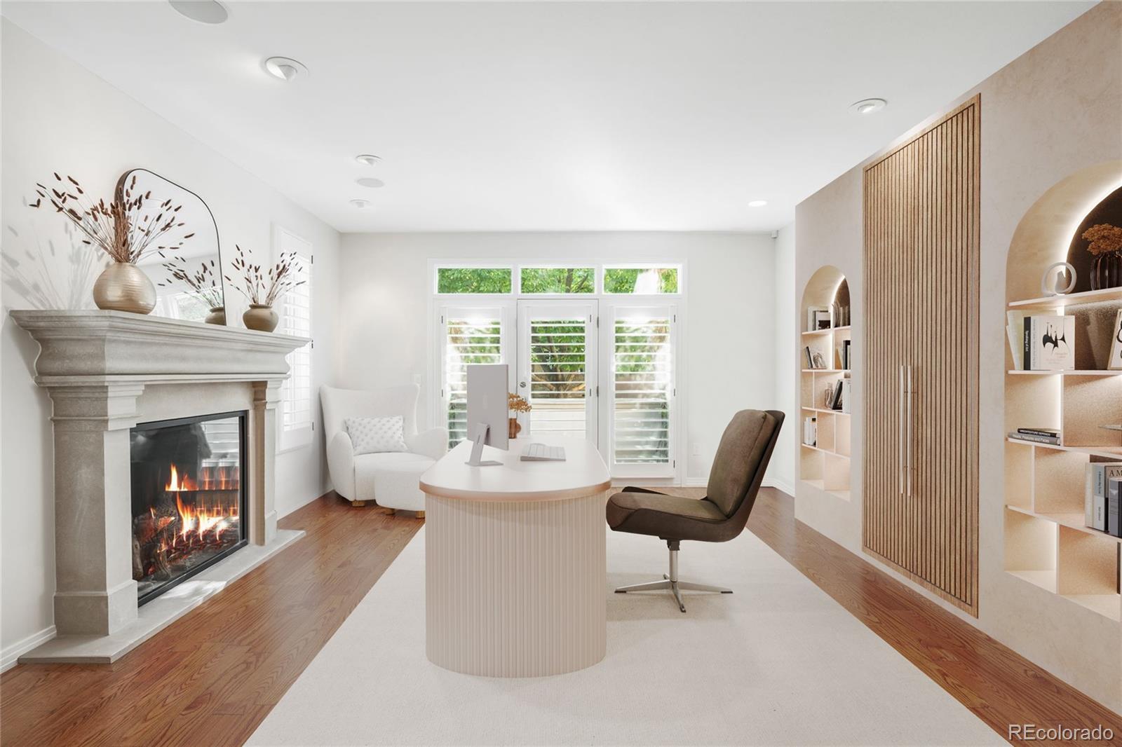 361 Detroit Street Denver, CO 80206 - Photo 3 of 46 a living room with furniture and a fireplace