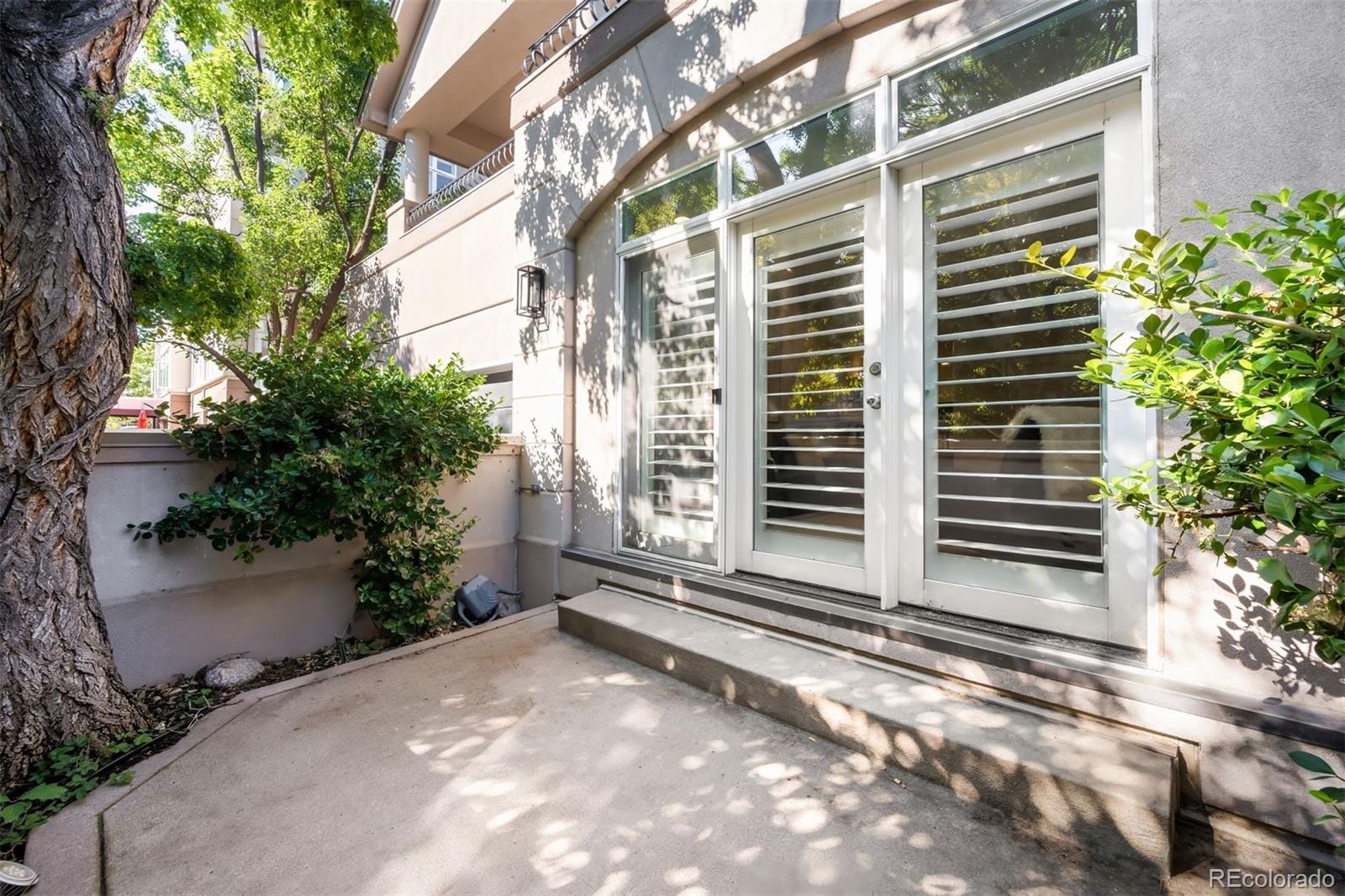 361 Detroit Street Denver, CO 80206 - Photo 44 of 46 a view of a house with a yard