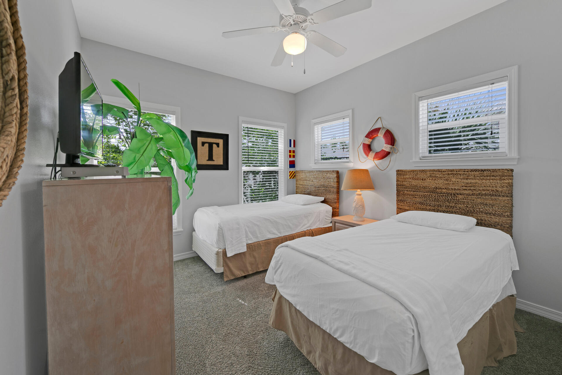 97 Hidden Lake Way Santa Rosa Beach, FL 32459 - Photo 32 of 50 a bedroom with two bed and a chandelier