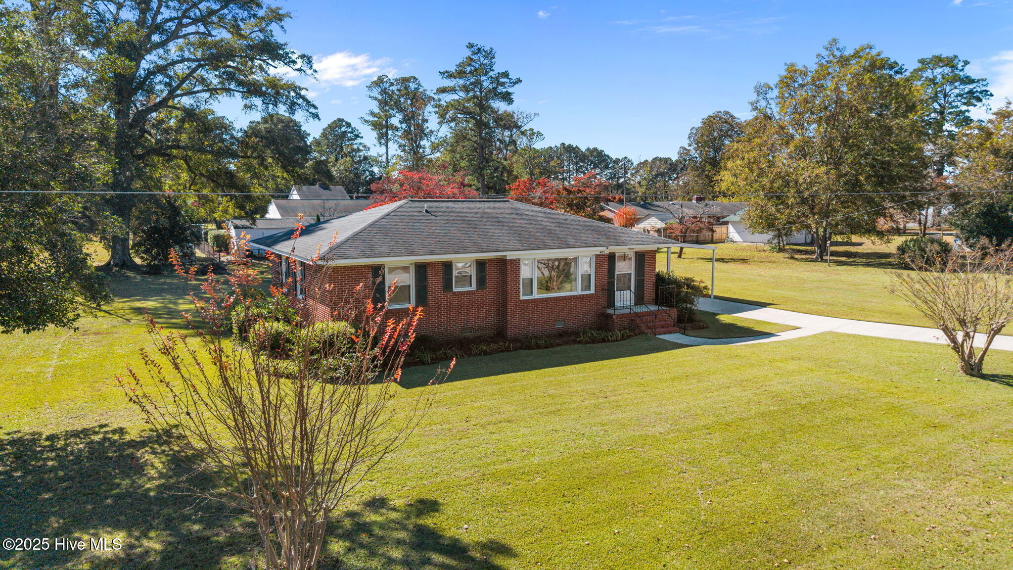 405 Pollock Street Pollocksville, NC 28573 - Photo 1 of 36 8-web-or-mls-DJI_20251104120517_0752_D