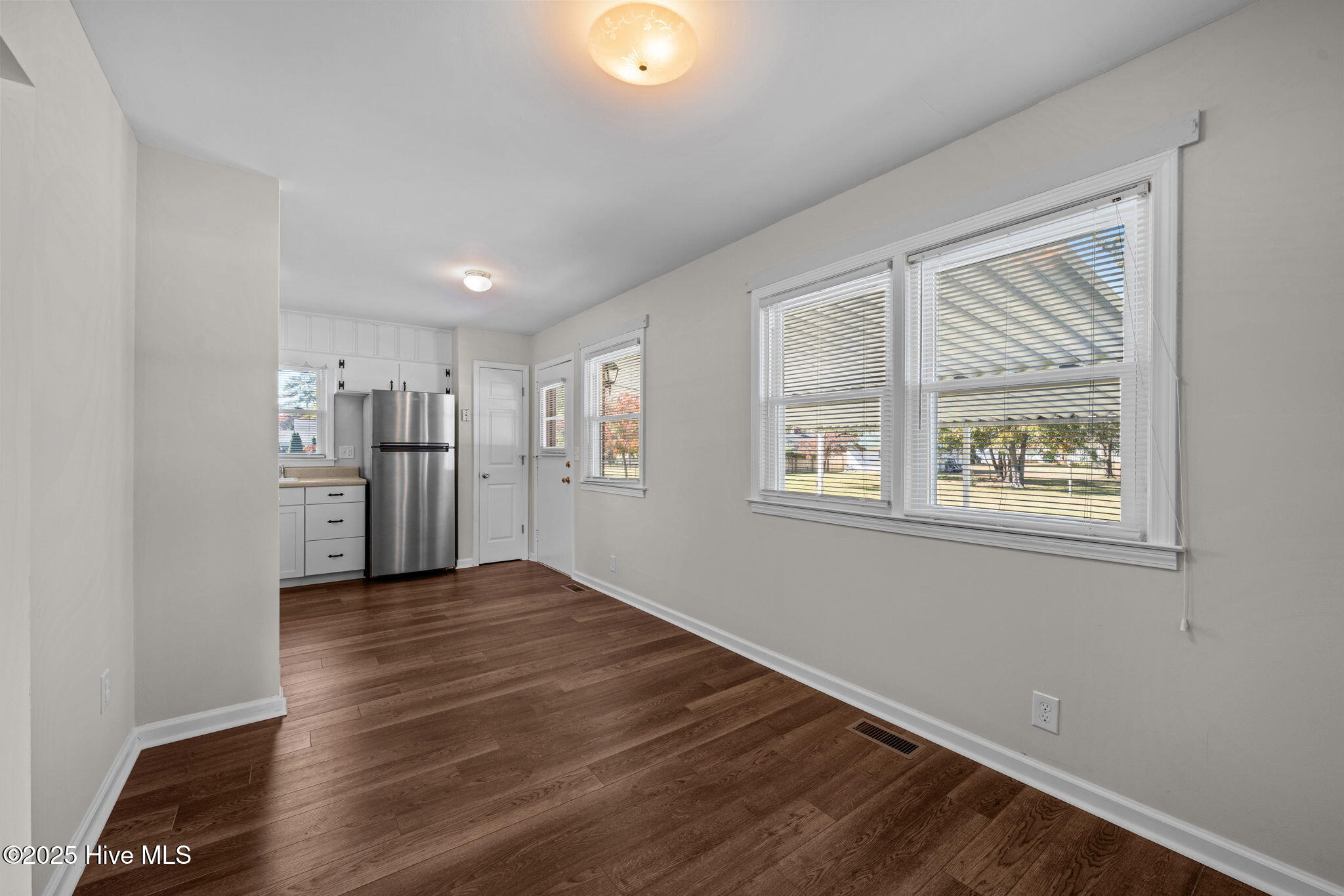 405 Pollock Street Pollocksville, NC 28573 - Photo 12 of 36 view looking into the kitchen and carport entrance