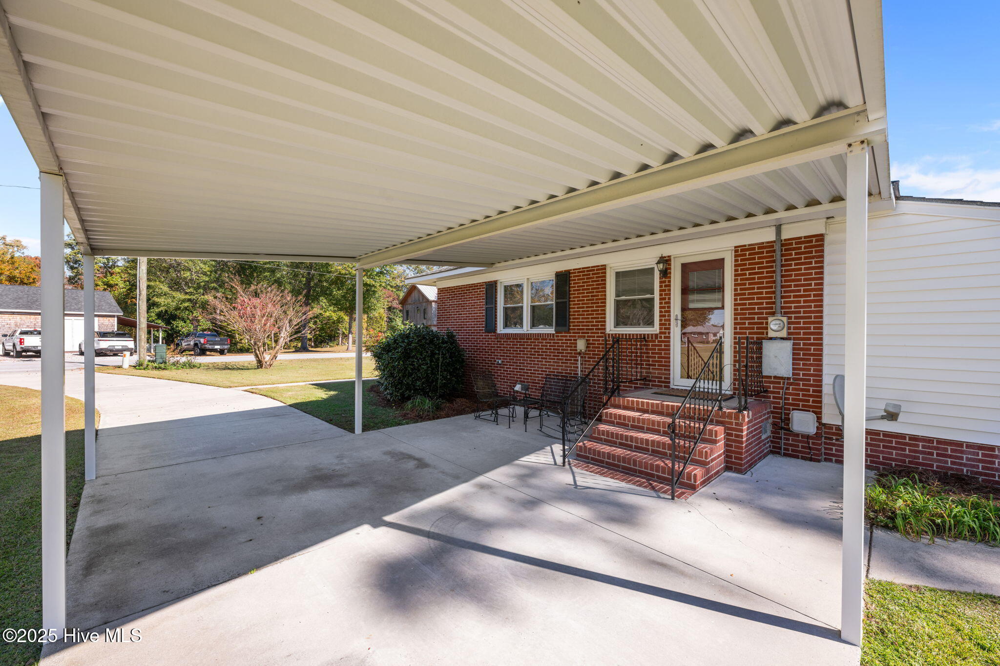 405 Pollock Street Pollocksville, NC 28573 - Photo 27 of 36 lovely carport with covered patio corner