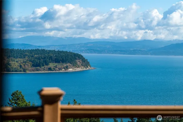 a view of a lake from a balcony