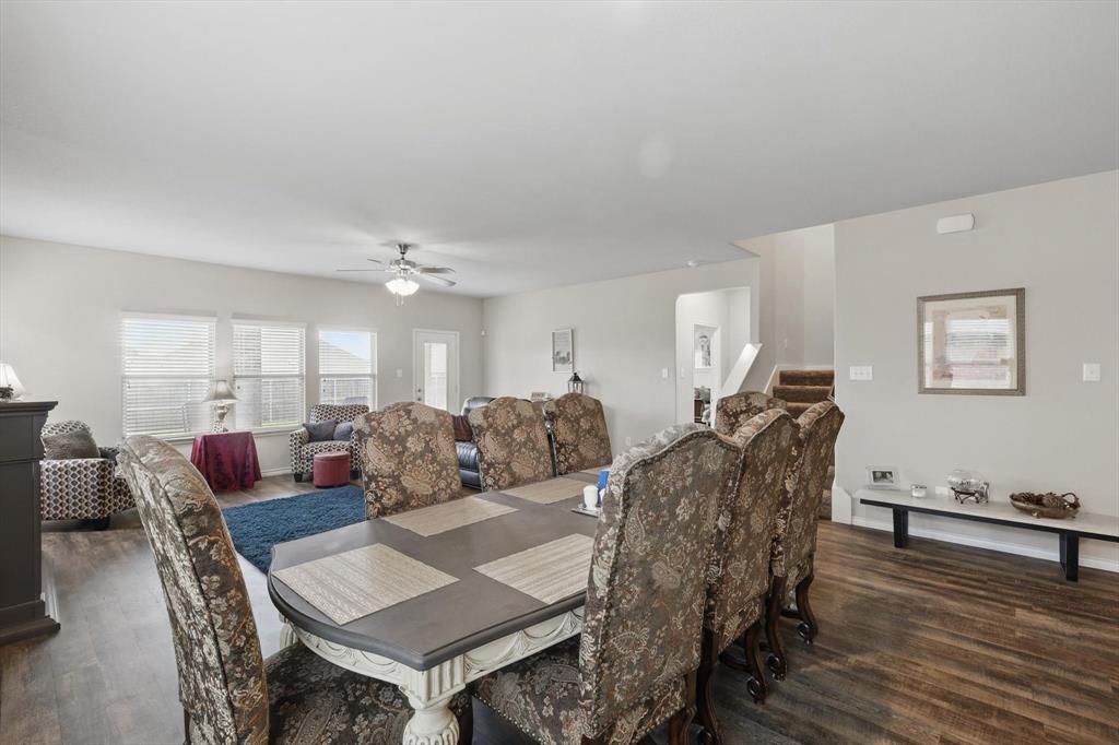 3013 Dominion Street Denton, TX 76209 - Photo 12 of 38 a living room with furniture and a wooden floor