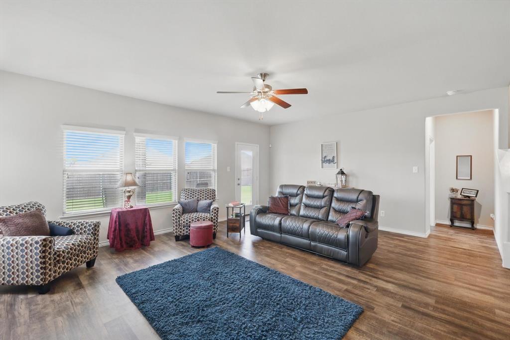 3013 Dominion Street Denton, TX 76209 - Photo 14 of 38 a living room with furniture or couch and a large window