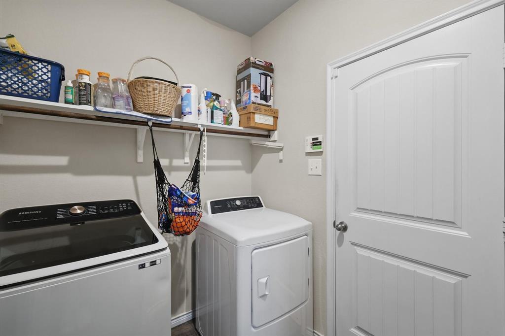 3013 Dominion Street Denton, TX 76209 - Photo 17 of 38 a utility room with dryer and washer