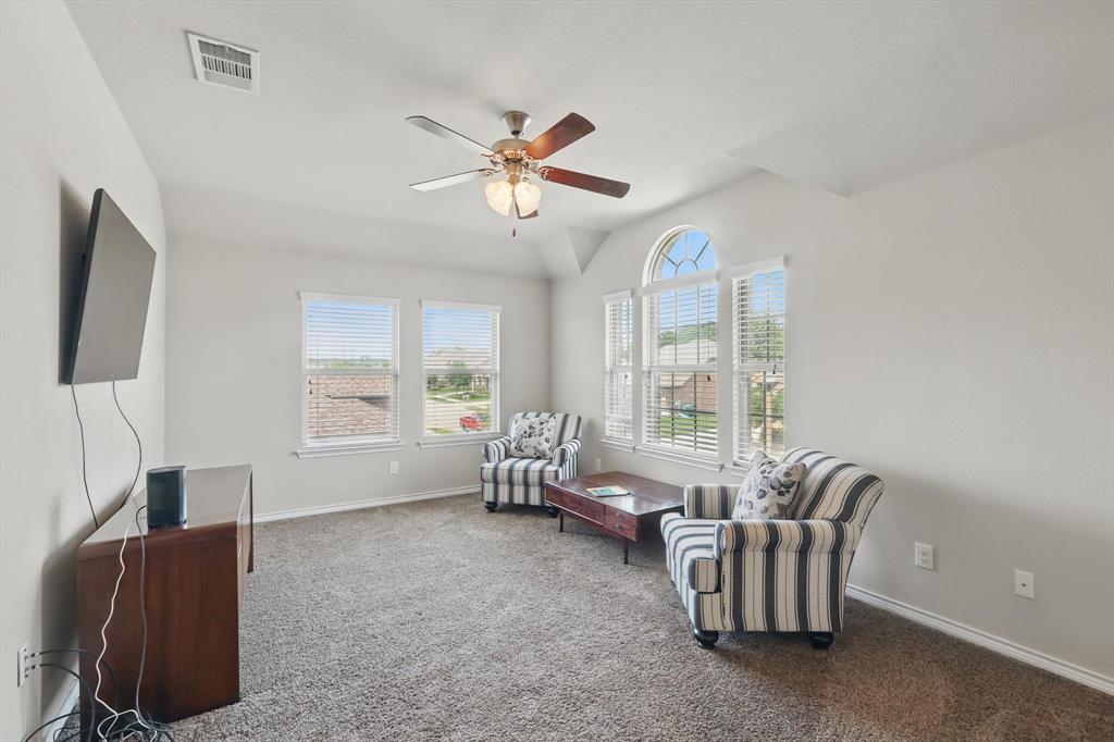 3013 Dominion Street Denton, TX 76209 - Photo 25 of 38 a living room with furniture and a window