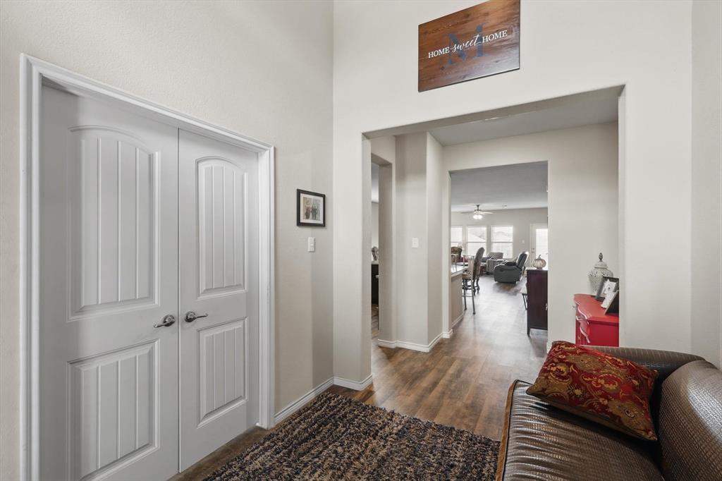 3013 Dominion Street Denton, TX 76209 - Photo 5 of 38 a living room with furniture and a wooden floor