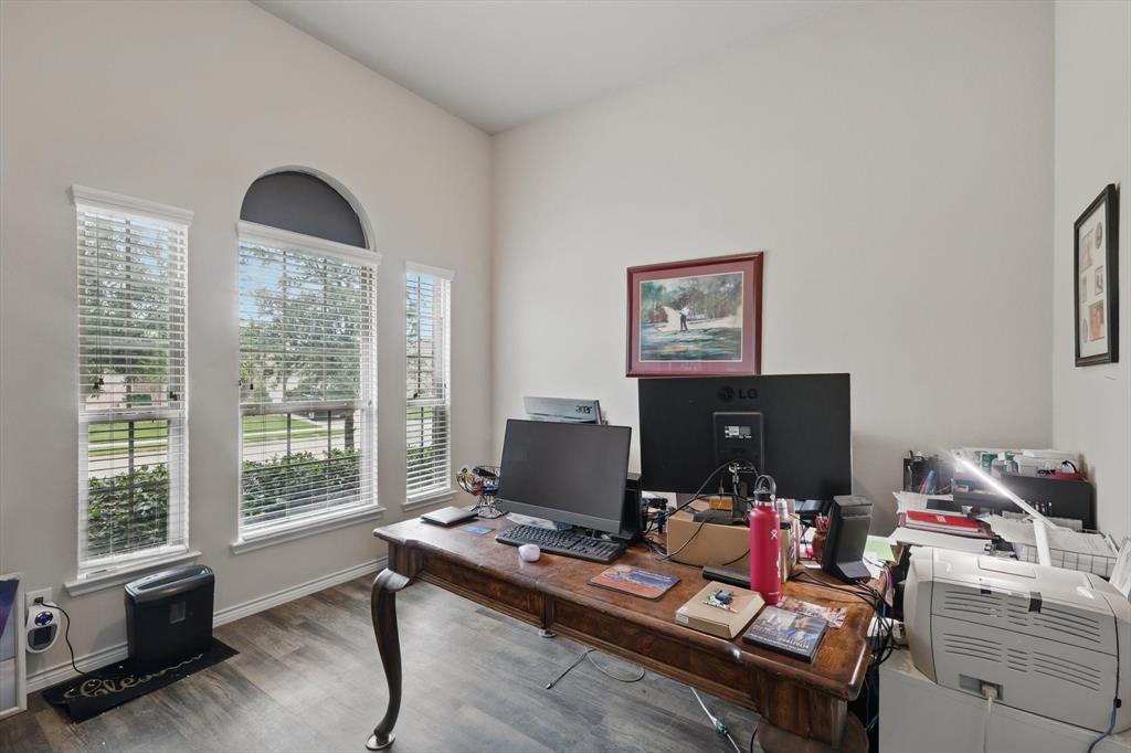 3013 Dominion Street Denton, TX 76209 - Photo 6 of 38 a workspace with furniture and a window