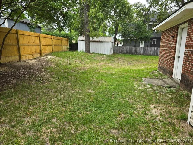 a view of a backyard with a garden