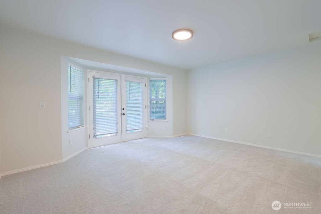 10720 Eustis Hunt Road East Graham, WA 98338 - Photo 14 of 27 an empty room with window