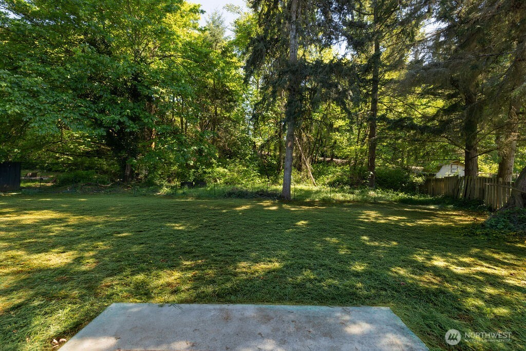 10720 Eustis Hunt Road East Graham, WA 98338 - Photo 20 of 27 a view of a trees with a yard