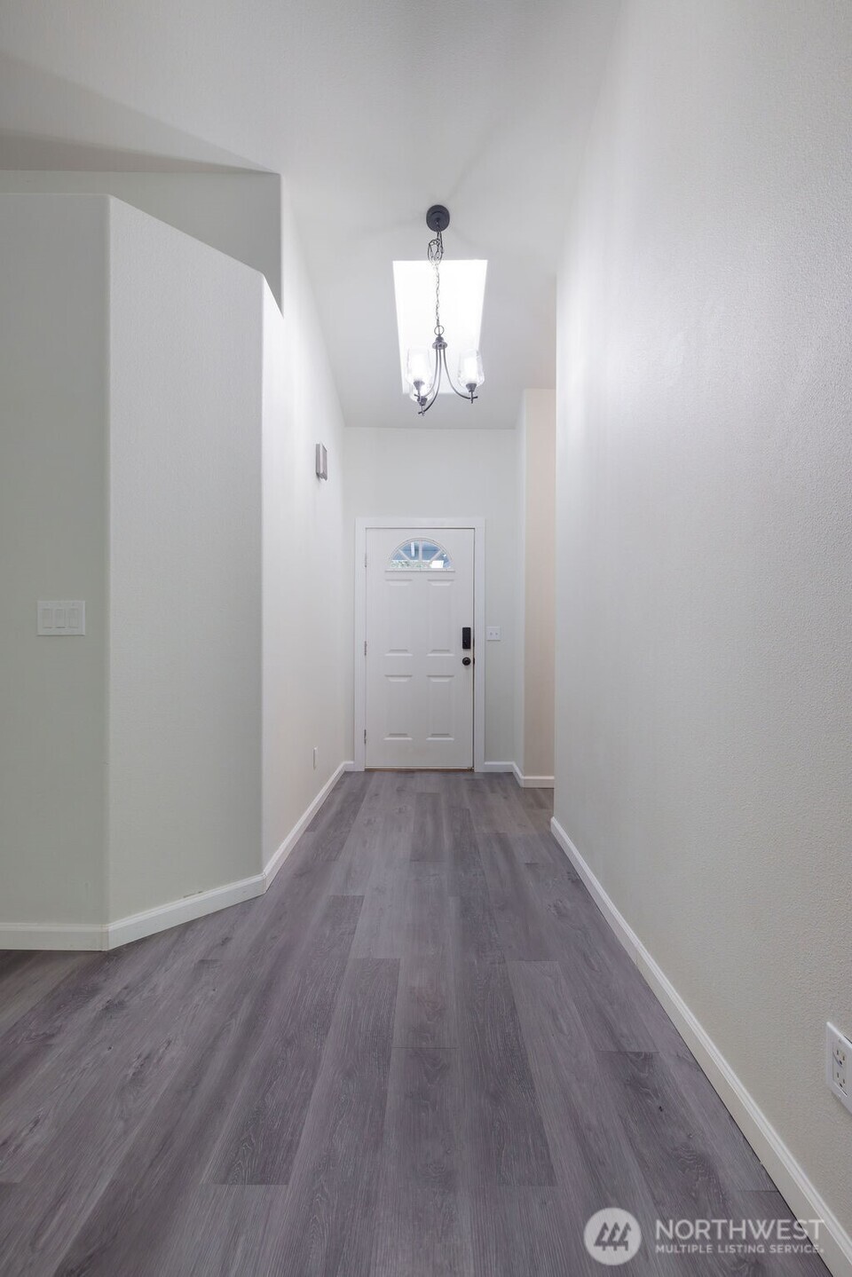 10720 Eustis Hunt Road East Graham, WA 98338 - Photo 3 of 27 wooden floor in an empty room