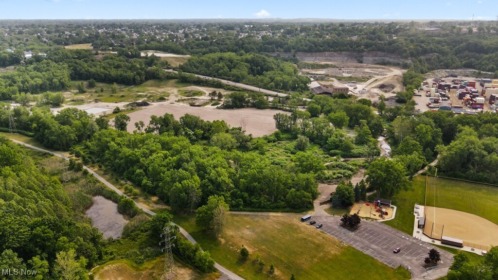 5000 Warner Road Garfield Heights, OH 44125 - Photo 28 of 41 Drone / aerial view of a tree filled landscape