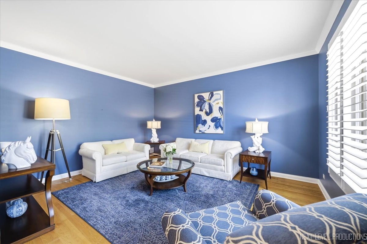 1914 North Ridge Avenue Arlington Heights, IL 60004 - Photo 6 of 50 a living room with furniture and a lamp