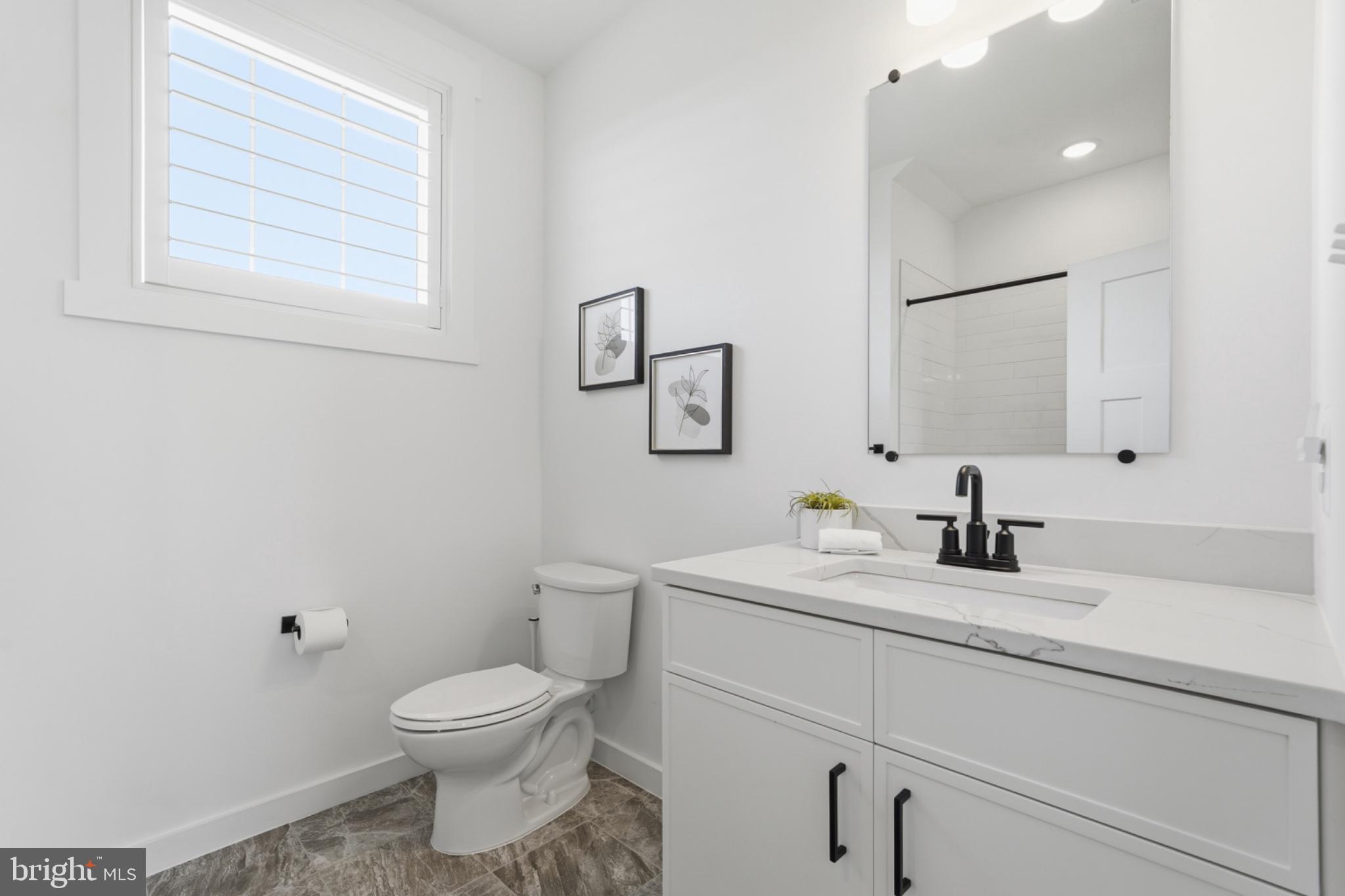 2802 Bidle Road Middletown, MD 21769 - Photo 49 of 63 Sleek and modern bathroom retreat.