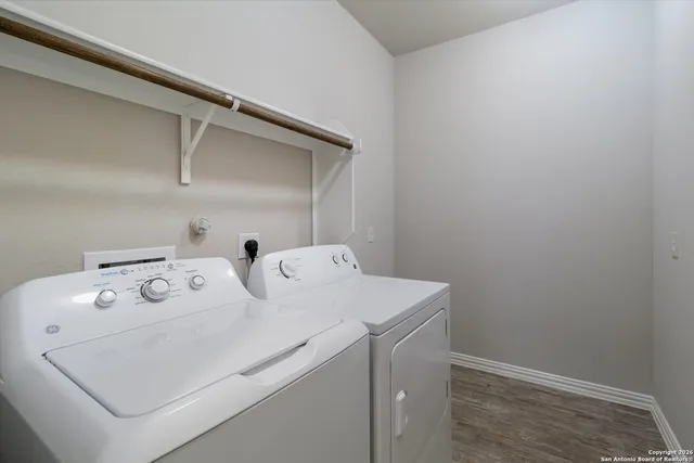 a utility room with dryer and washer