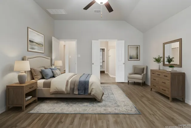 a bedroom with furniture and a couch