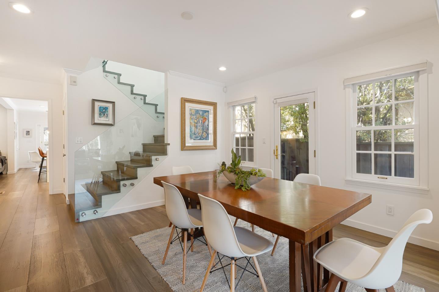 1467 Cabrillo Avenue Burlingame, CA 94010 - Photo 11 of 57 a view of a dining room with furniture and wooden floor