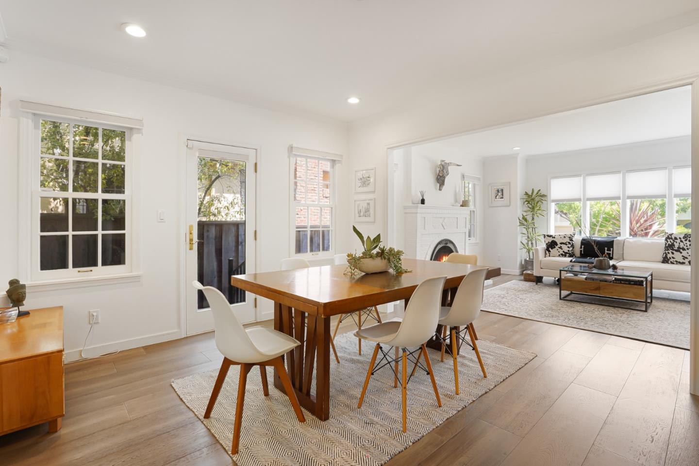 1467 Cabrillo Avenue Burlingame, CA 94010 - Photo 12 of 57 a view of a dining room with furniture and a large window