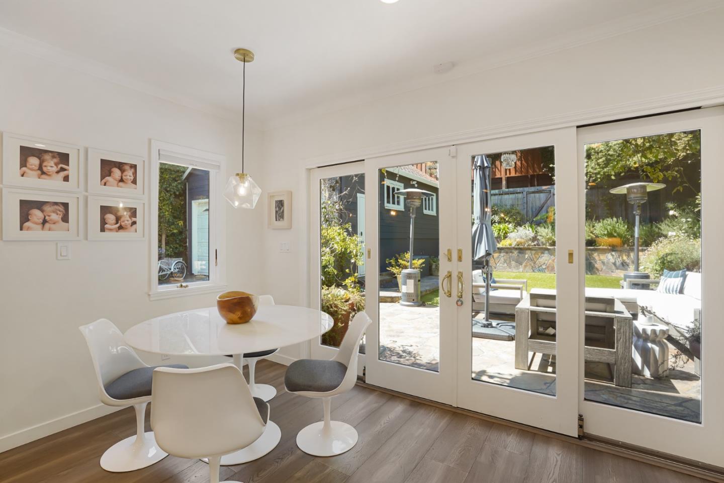 1467 Cabrillo Avenue Burlingame, CA 94010 - Photo 22 of 57 a view of a dining room with furniture and wooden floor
