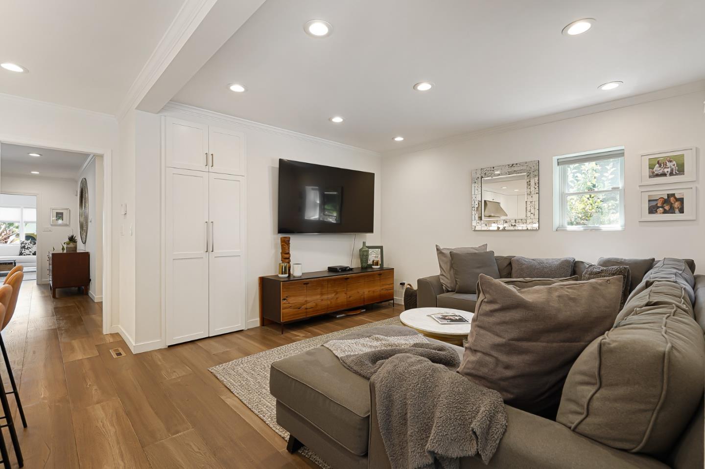 1467 Cabrillo Avenue Burlingame, CA 94010 - Photo 24 of 57 a living room with furniture and a flat screen tv