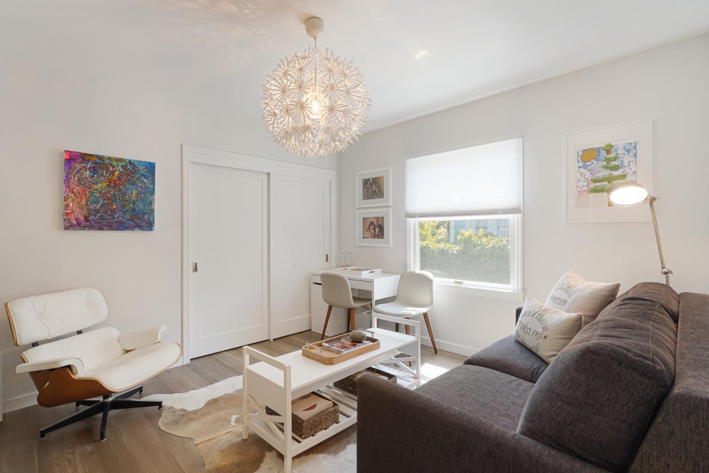 1467 Cabrillo Avenue Burlingame, CA 94010 - Photo 27 of 57 a living room with furniture a chandelier and a window