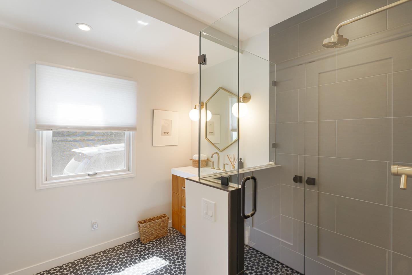 1467 Cabrillo Avenue Burlingame, CA 94010 - Photo 29 of 57 a bathroom with a sink a toilet and a mirror