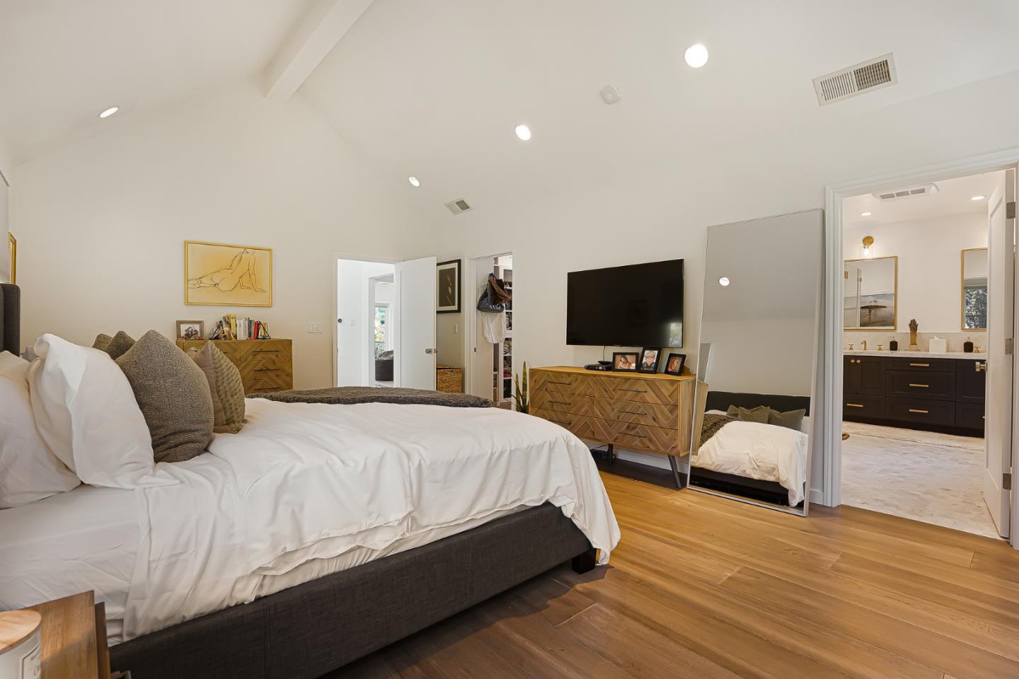 1467 Cabrillo Avenue Burlingame, CA 94010 - Photo 35 of 57 a bedroom with a bed and a flat screen tv