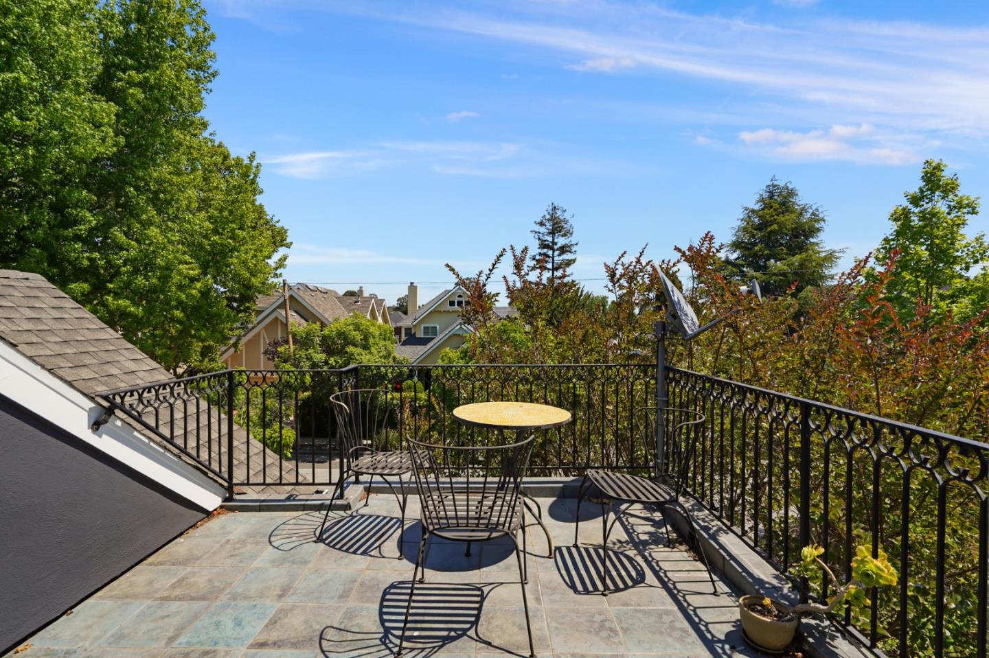 1467 Cabrillo Avenue Burlingame, CA 94010 - Photo 48 of 57 a view of a balcony with two chairs and a potted plant