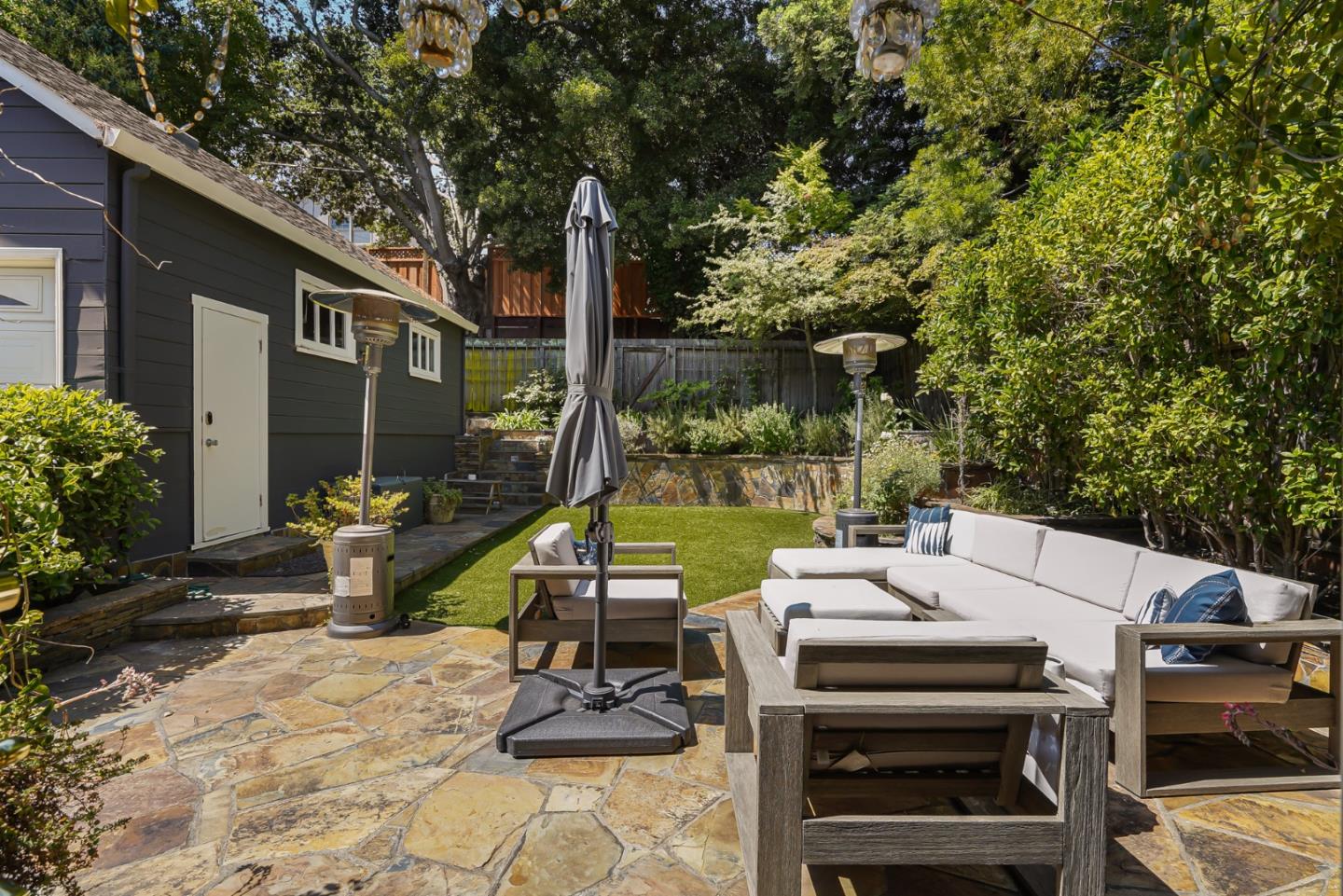 1467 Cabrillo Avenue Burlingame, CA 94010 - Photo 52 of 57 a view of a patio with chairs and a table