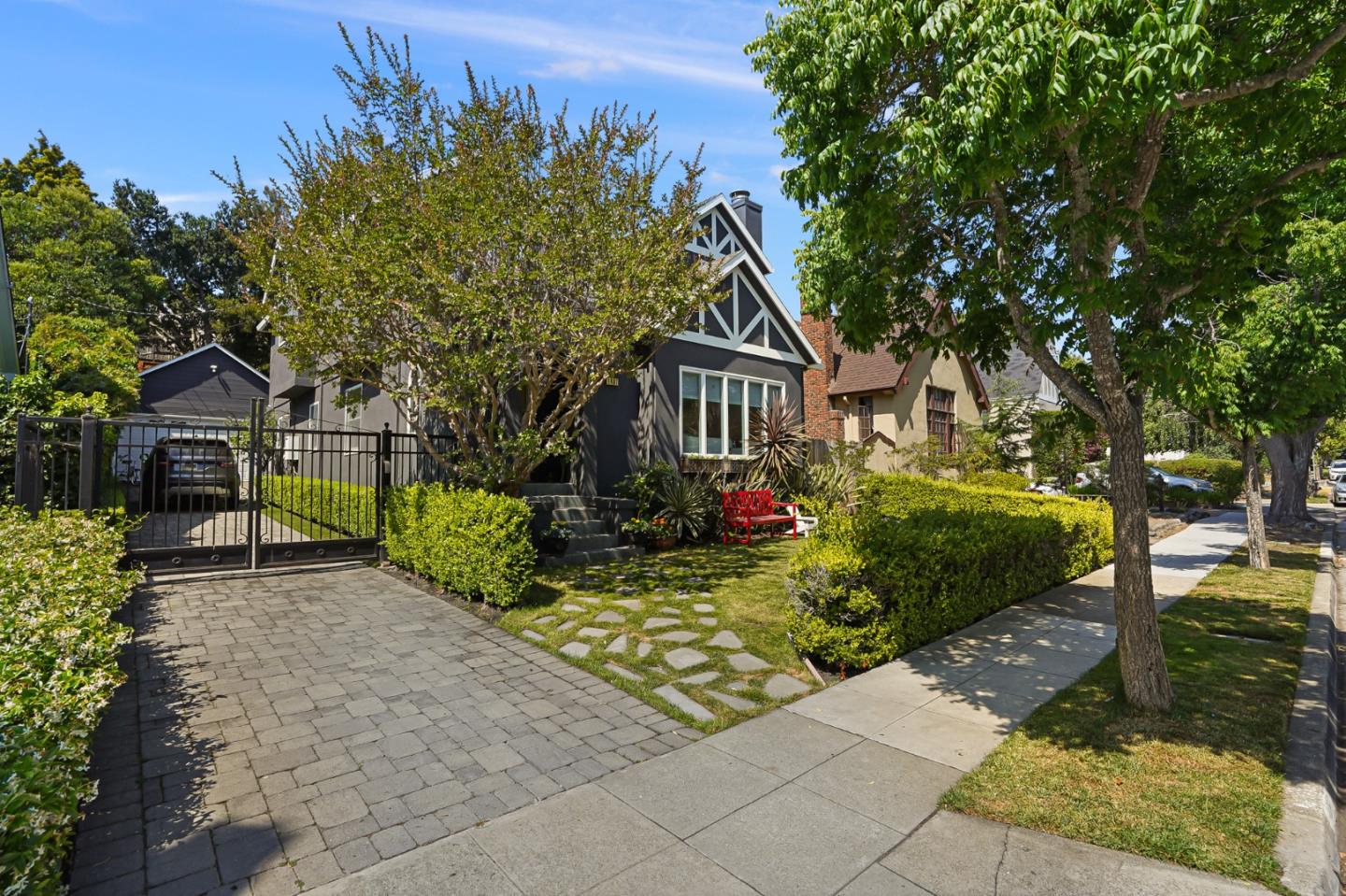 1467 Cabrillo Avenue Burlingame, CA 94010 - Photo 55 of 57 a front view of a house with a yard and trees