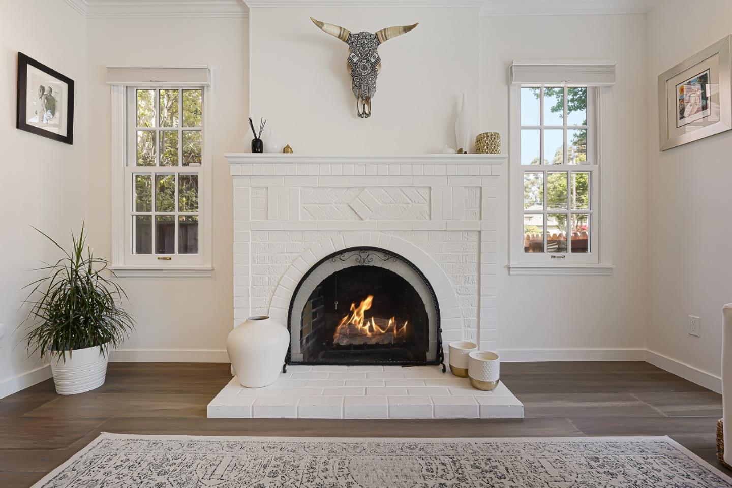 1467 Cabrillo Avenue Burlingame, CA 94010 - Photo 8 of 57 a living room with a fireplace and window