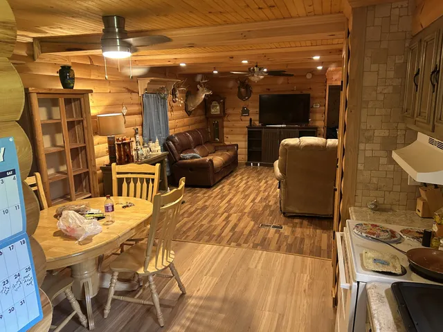 a balcony with table and chairs