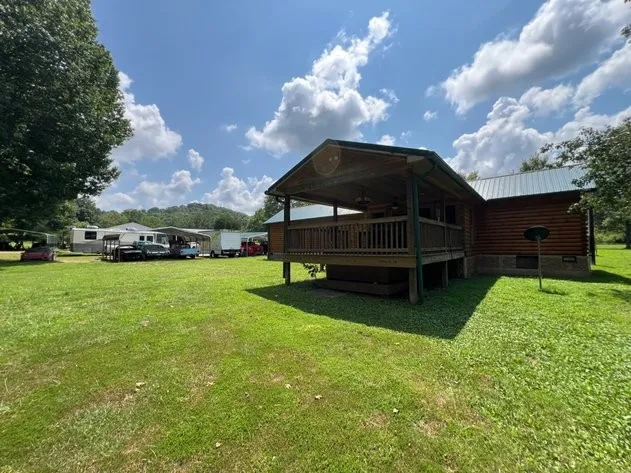 a view of a house with a back yard