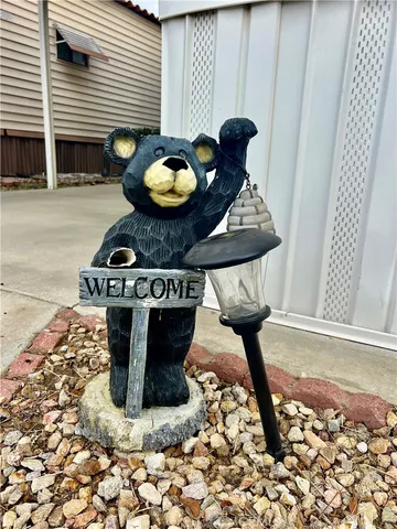 a table with wine bottles and glasses on it