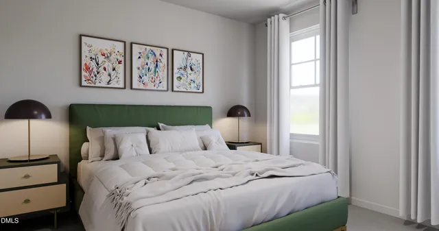 a bedroom with a bed and a painting on the wall