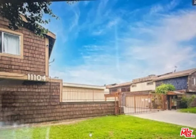 a view of a backyard with plants