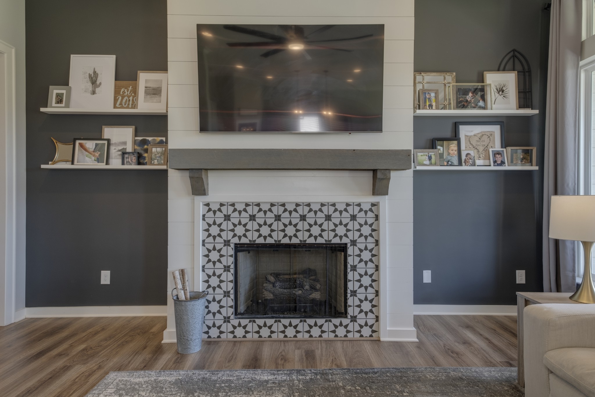 1017 Fallow Road Mount Juliet, TN 37122 - Photo 14 of 66 a living room with a fireplace and cabinets