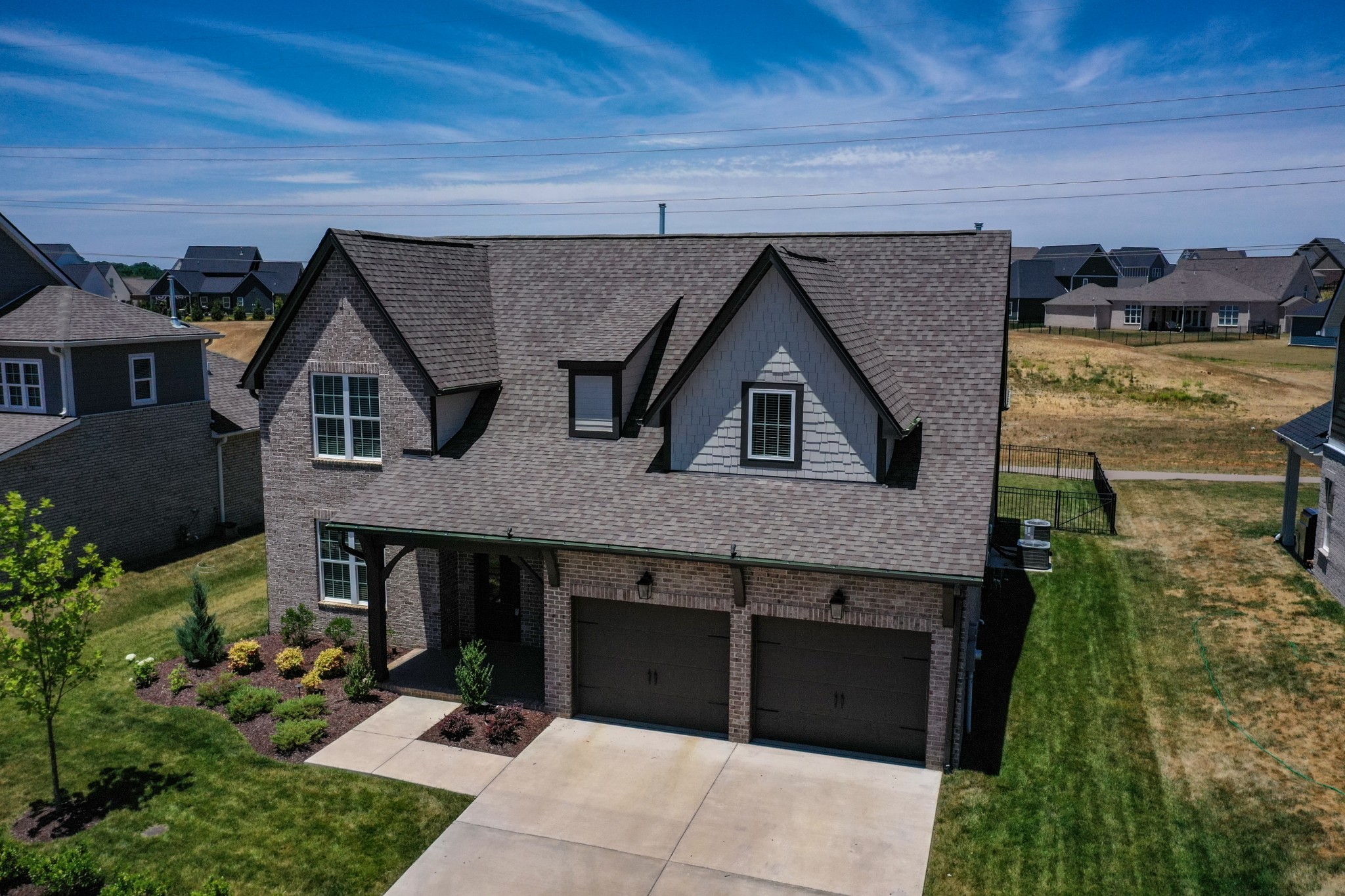 1017 Fallow Road Mount Juliet, TN 37122 - Photo 2 of 66 a front view of a house with a garden