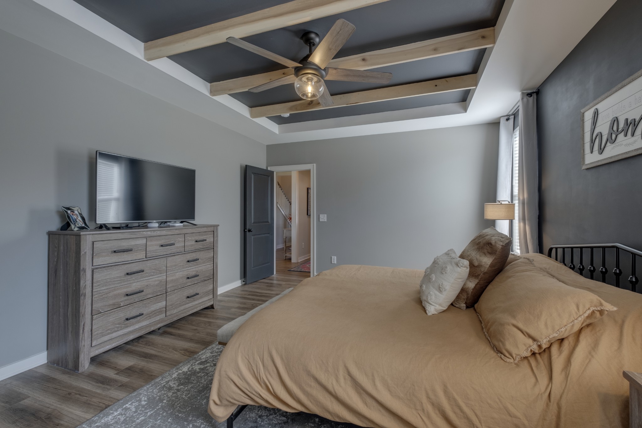 1017 Fallow Road Mount Juliet, TN 37122 - Photo 28 of 66 a bedroom with a bed and a flat screen tv