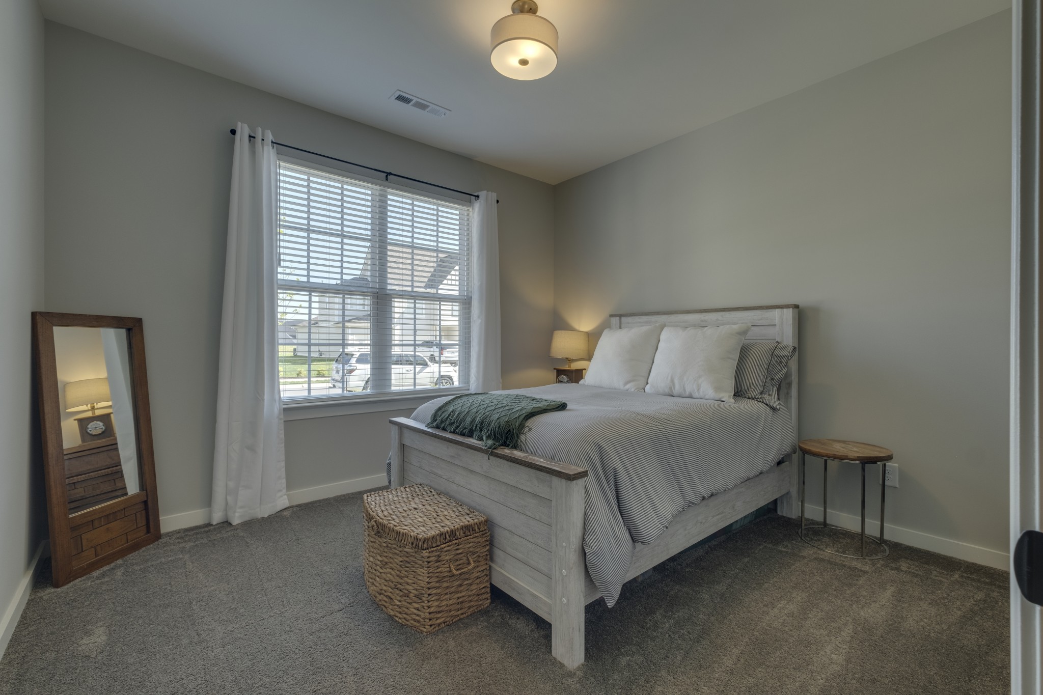 1017 Fallow Road Mount Juliet, TN 37122 - Photo 32 of 66 a bedroom with a bed and a window