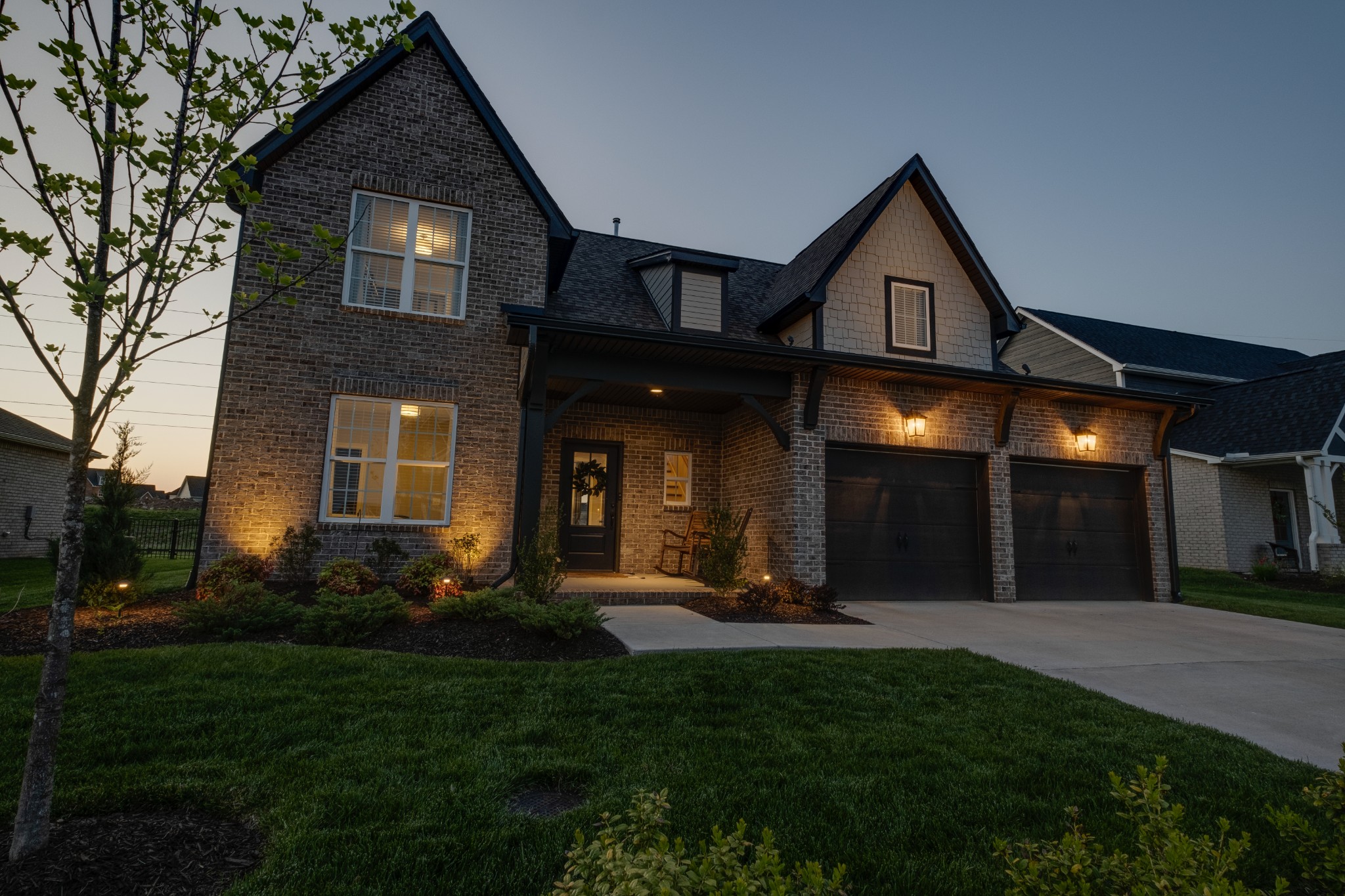 1017 Fallow Road Mount Juliet, TN 37122 - Photo 47 of 66 a front view of a house with a yard and outdoor seating