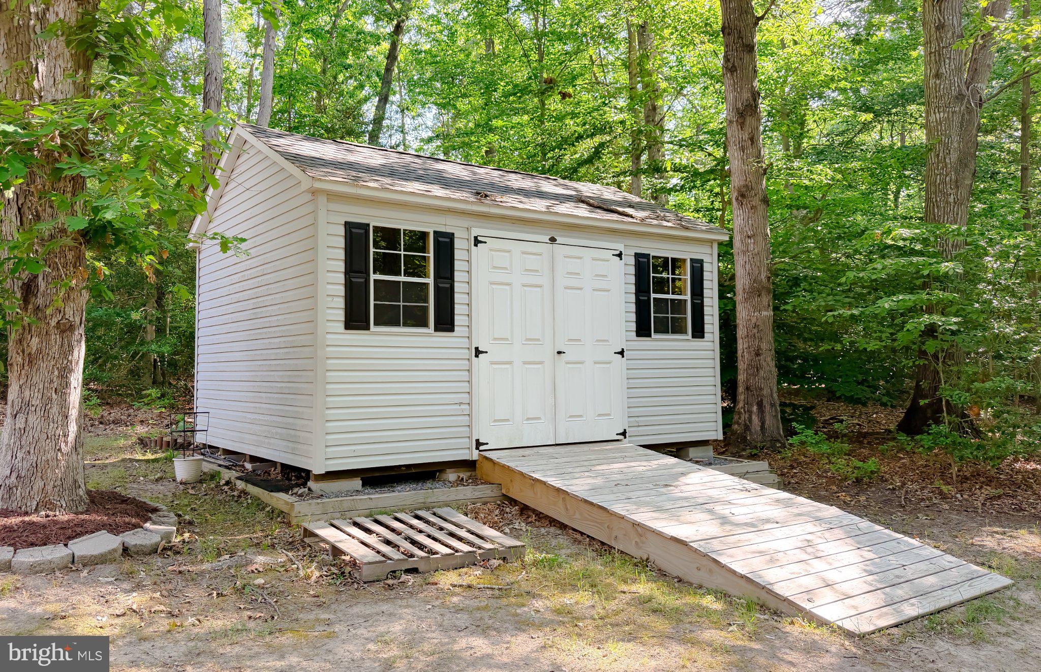 6020 Port Tobacco Road Indian Head, MD 20640 - Photo 58 of 59 Charming shed nestled in nature's embrace.
